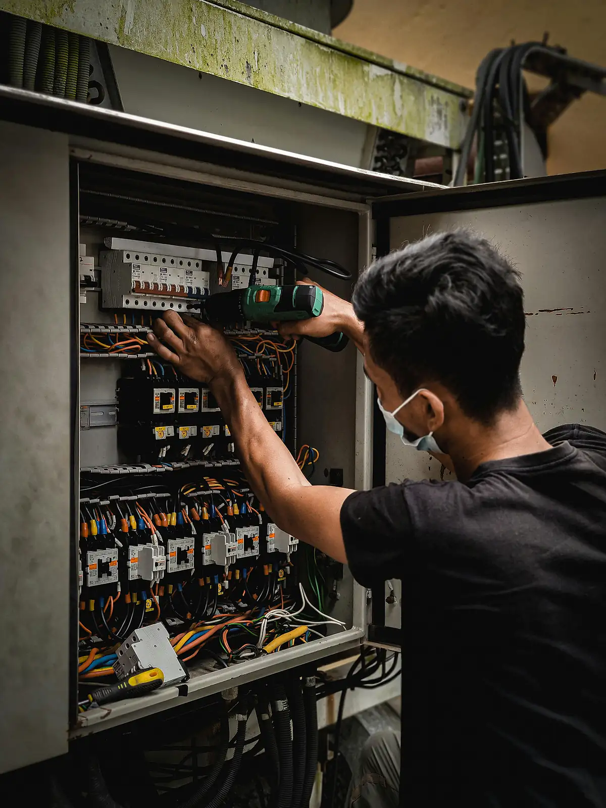 Electrician performing installation work